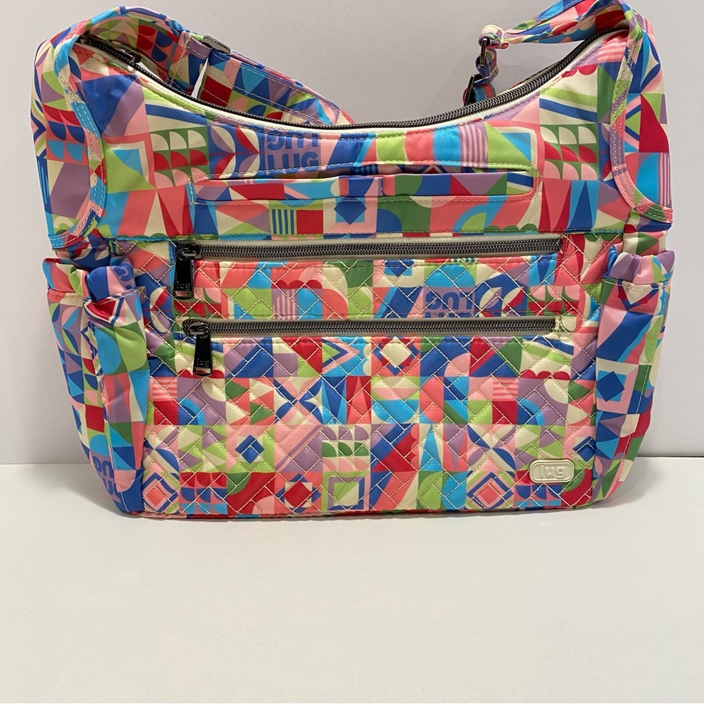 🦚 Lug Camper SE Crossbody Bag. NWT. “Disney Small World” pattern